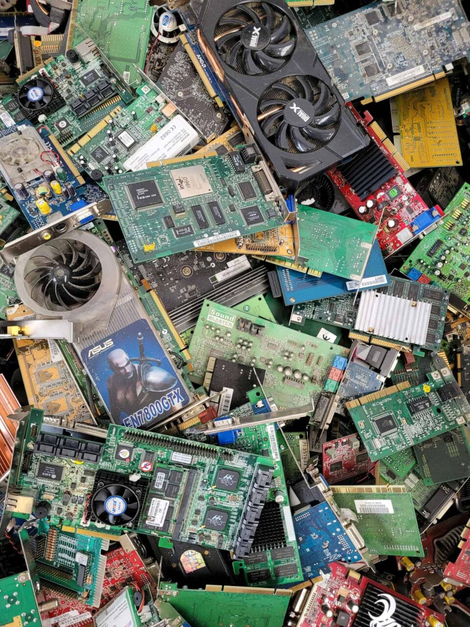 Discarded computer circuit boards highlighting the real risk begins once assets leave your site.